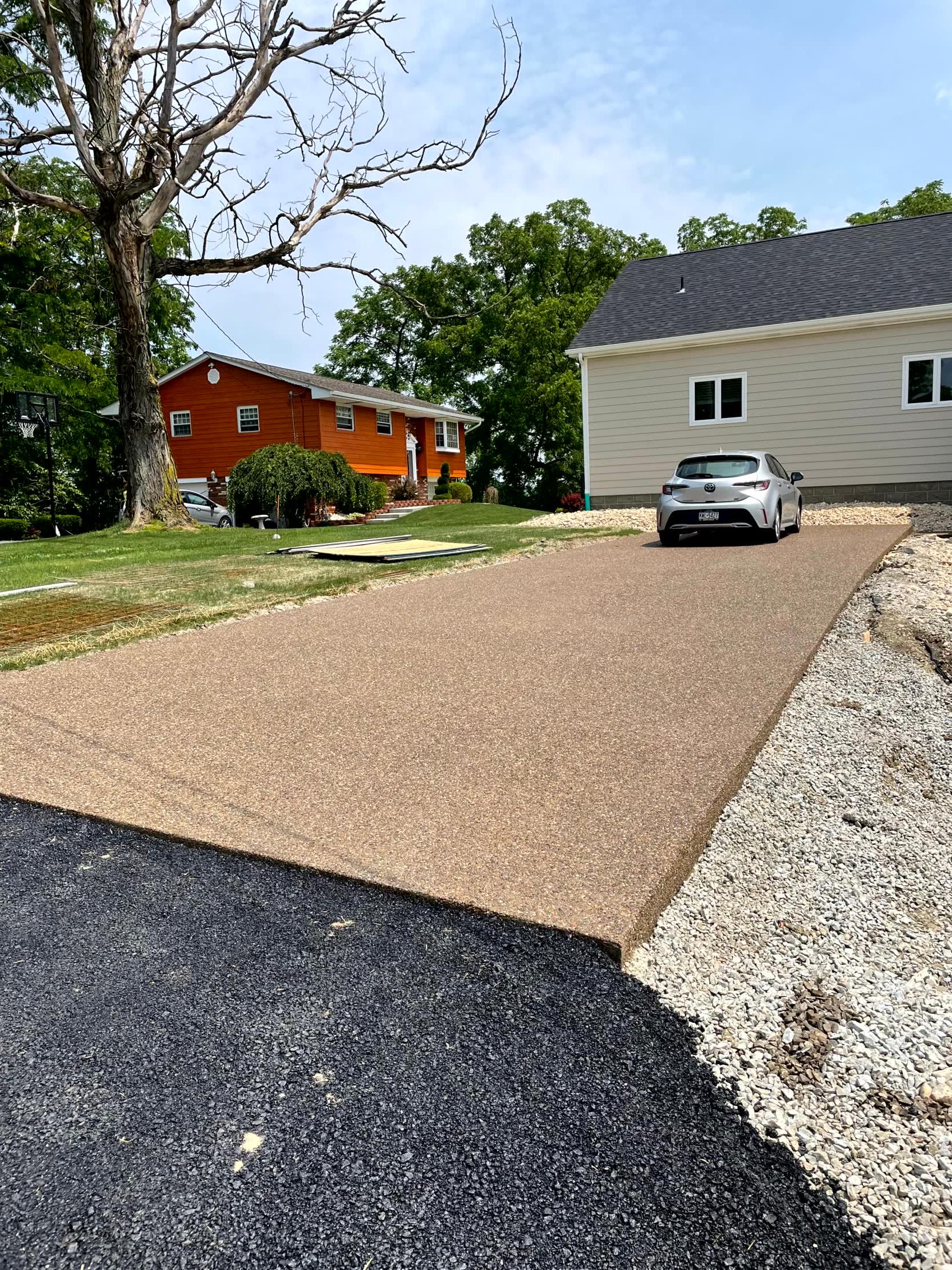 Light Colored Exposed Driveway Replacement