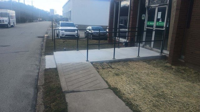 Building Entrance Concrete and Railing Replacement